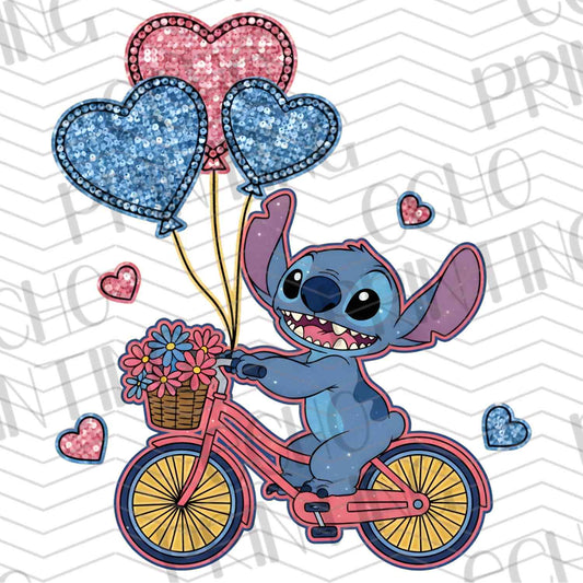 VLTC 49 – BLUE ALIEN ON BIKE WITH BALLOONS