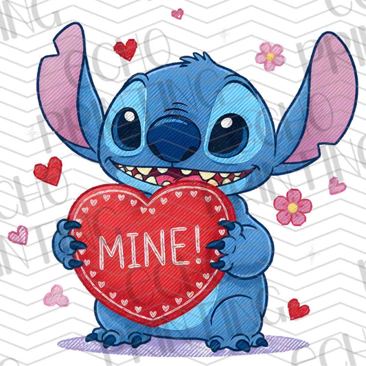 VLTC 63 – BLUE ALIEN HOLDING HEART SIGN